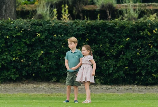 WOKINGHAM, ENGLAND - JULY 10: Prince George and Princess Charlotte attend The King Power Royal Chari...