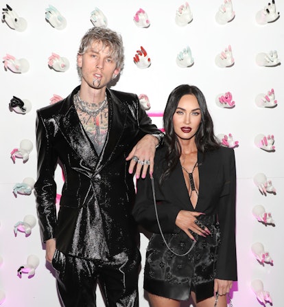 Megan Fox and Machine Gun Kelly chained themselves together by their nails at the launch of Machine ...