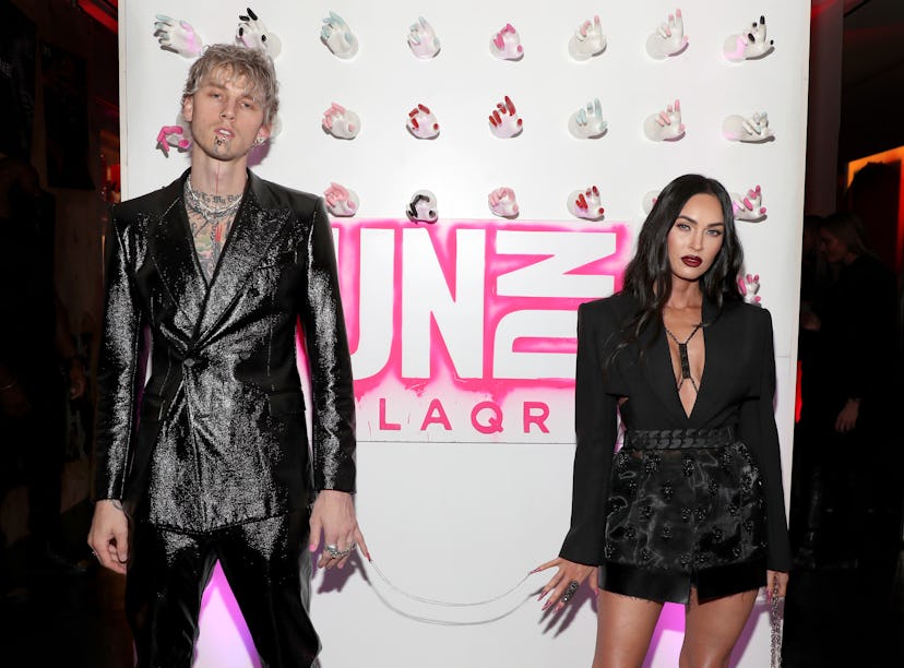 Megan Fox and Machine Gun Kelly chained themselves together by their nails at the launch of Machine ...