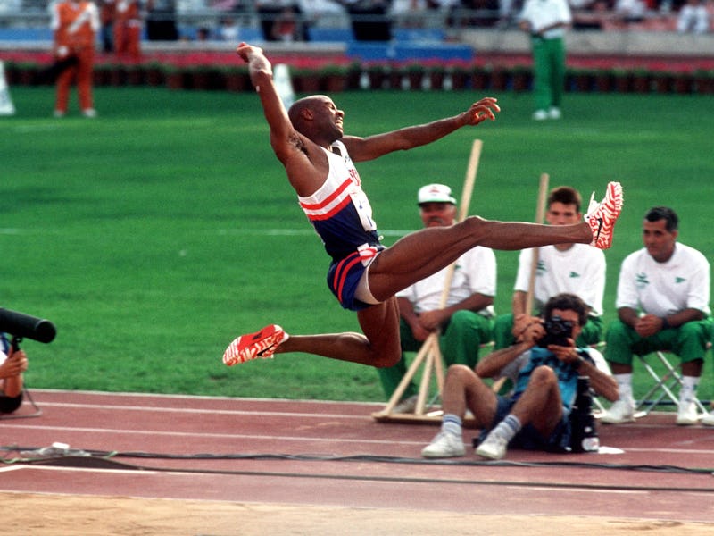 USA's Mike Powell leaps to a silver medal in the long jump (Photo by S&G/PA Images via Getty Images...