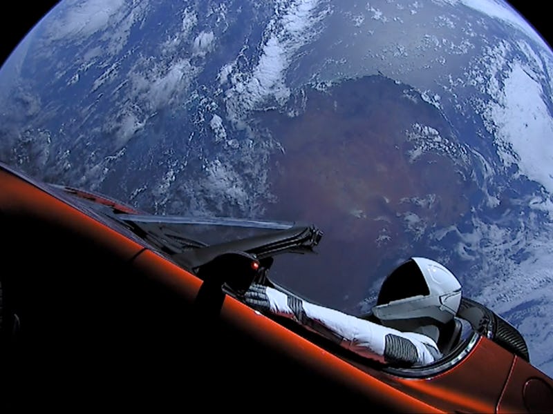 IN SPACE - FEBRUARY 8: In this handout photo provided by SpaceX, a Tesla roadster launched from the ...