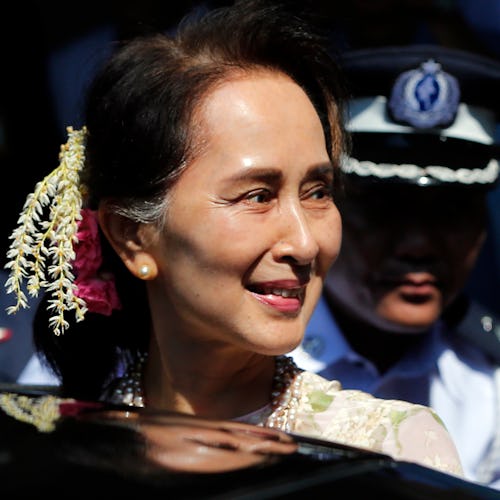 (FILE PHOTO) Myanmar State Counselor Aung San Suu Kyi leaves after an opening ceremony of centenary ...