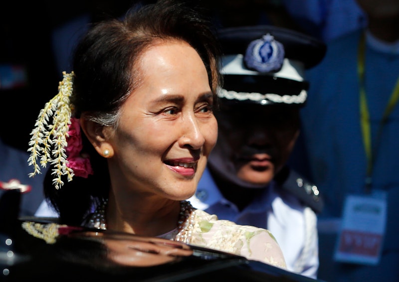 (FILE PHOTO) Myanmar State Counselor Aung San Suu Kyi leaves after an opening ceremony of centenary ...