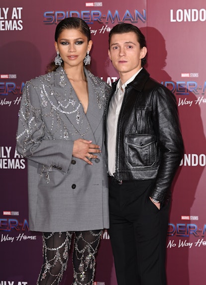 Zendaya and Tom Holland at  a photocall for "Spiderman: No Way Home" 