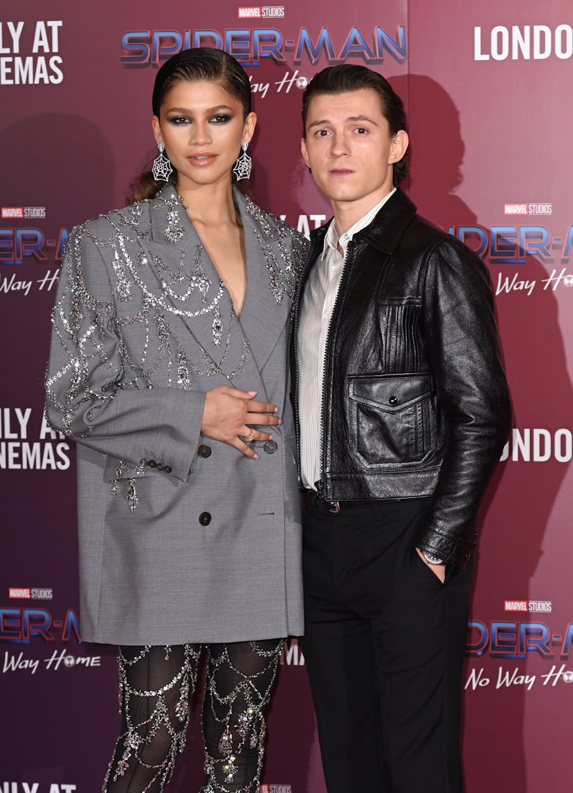 Zendaya and Tom Holland at  a photocall for "Spiderman: No Way Home"