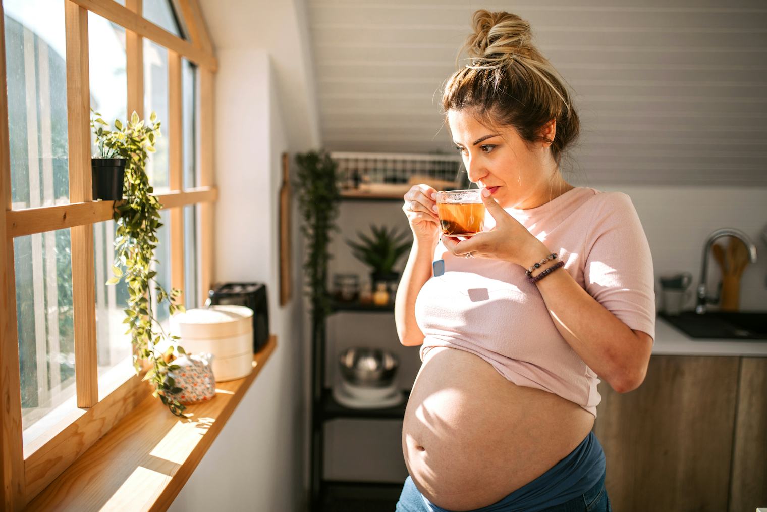 Can Coughing While Pregnant Hurt The Baby? Experts Explain