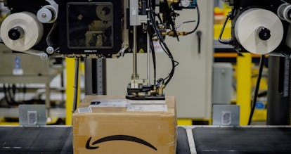 EASTVALE, CA - AUGUST 31: A package on the conveyor belt gets its label at Amazon fulfillment center...