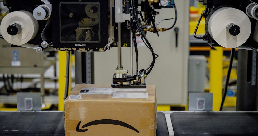 EASTVALE, CA - AUGUST 31: A package on the conveyor belt gets its label at Amazon fulfillment center...