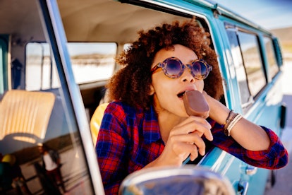 A girl with ice cream on a road trip is the aesthetic you'll want for travel trends in 2022, accordi...