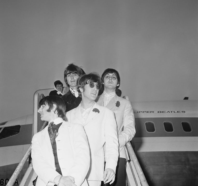 British rock group the Beatles arrive at London Airport on the 'Clipper Beatles', after their final ...