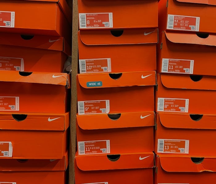 NOVATO, CALIFORNIA - SEPTEMBER 27: Stacks of Nike shoe boxes sit on a shelf at a shoe store on Sept...