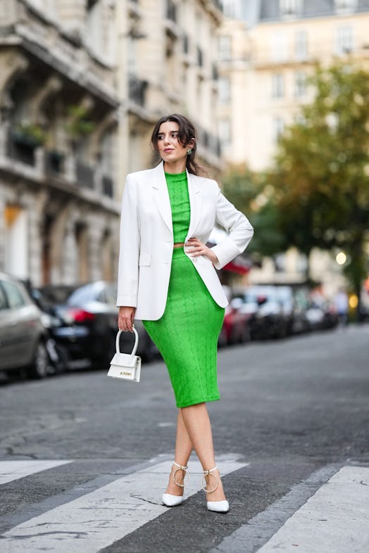 Ketevan Giorgadze wears a green cropped knit jersey turtleneck and a matching green knit jersey penc...