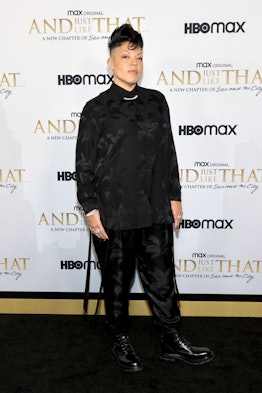 Sara Ramirez wears black shirt and pants set.