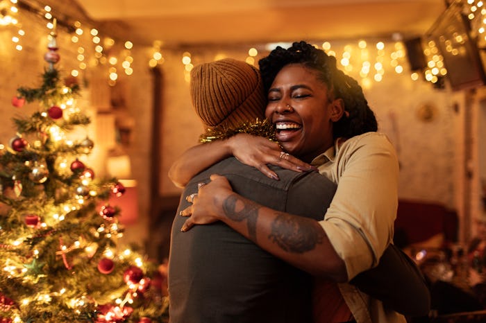 Couple hugging on Christmas eve