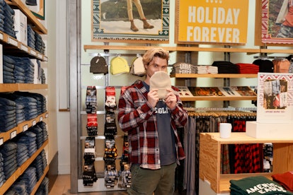 NEW YORK, NEW YORK - DECEMBER 03: Chase Stokes shops for the Holidays at American Eagle SoHo on Dece...