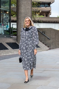 LONDON, ENGLAND - SEPTEMBER 17: Artist Sophie Tea wears an Alessandra Rich dress and Roger Vivier sh...