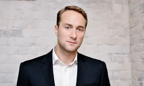 Oliver Chris at a party