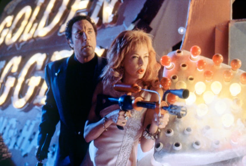 Welsh singer Tom Jones and American actress Annette Bening on the set of Mars Attacks!, directed by ...