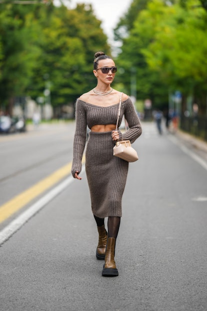 Mary Leest wears a brown knit Fendi sweater and skirt