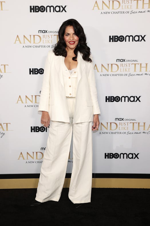 Sarita Choudhury wears a white pantsuit set.