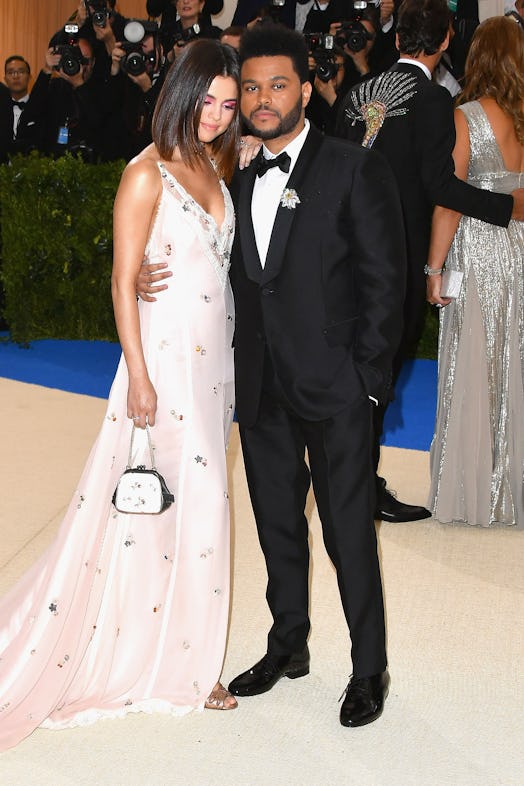 The Weeknd and Selena Gomez at the 2016 Met Gala. Photo via Getty Images