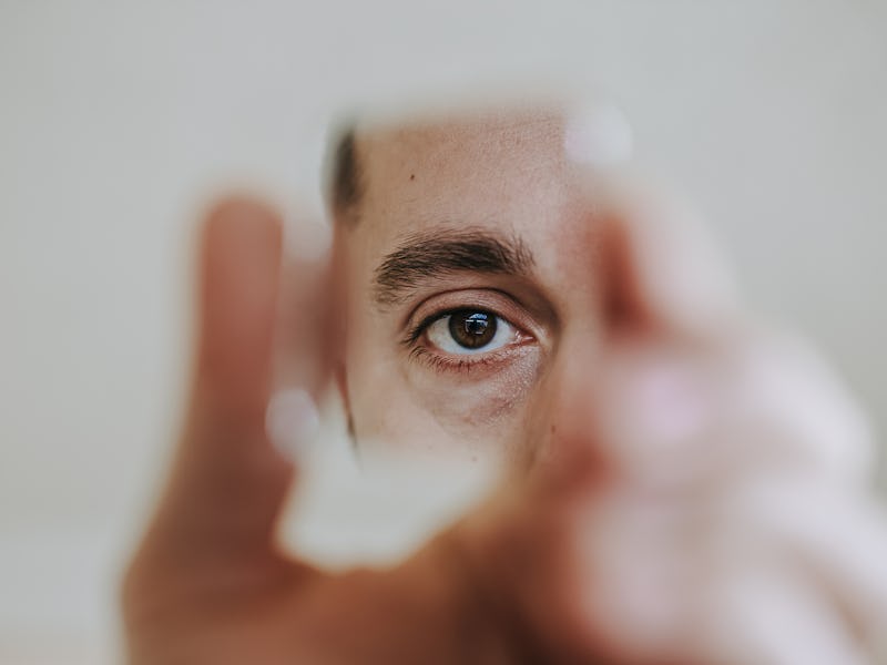 man looking in mirror photo illustration