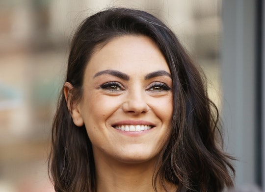 Mila Kunis is ready to escape her two kids.