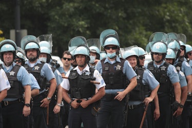 A group of Chicago police officers wearing riot gear.