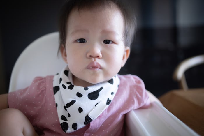 baby girl in high chair