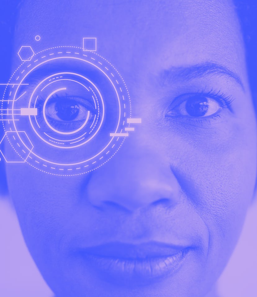 A young woman is seen staring directly at the camera. There are hovering labels on her left eye. The...