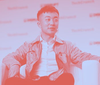 Carl Pei seated on stage at the TechCrunch Disrupt conference.