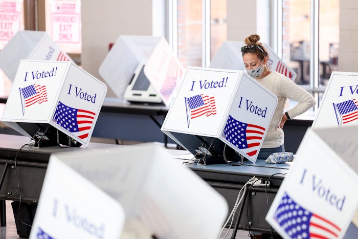 woman voting at the polls