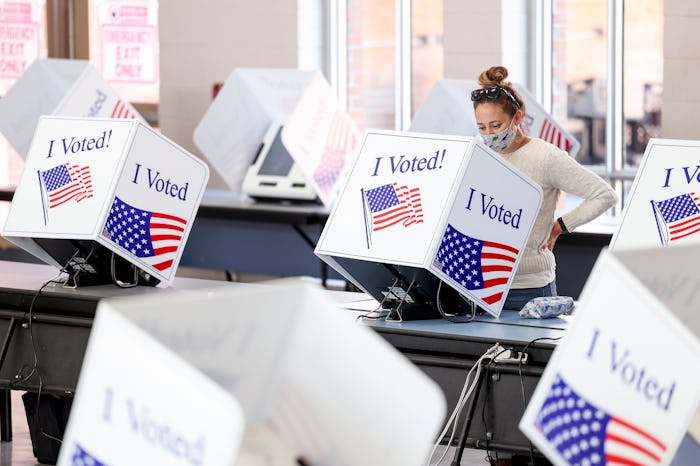 woman voting at the polls