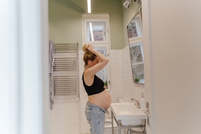 pregnant woman in bathroom