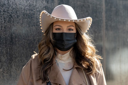 Bella Gerard poses outside New York Fashion Week at Spring Studios on February 16, 2021 in New York ...