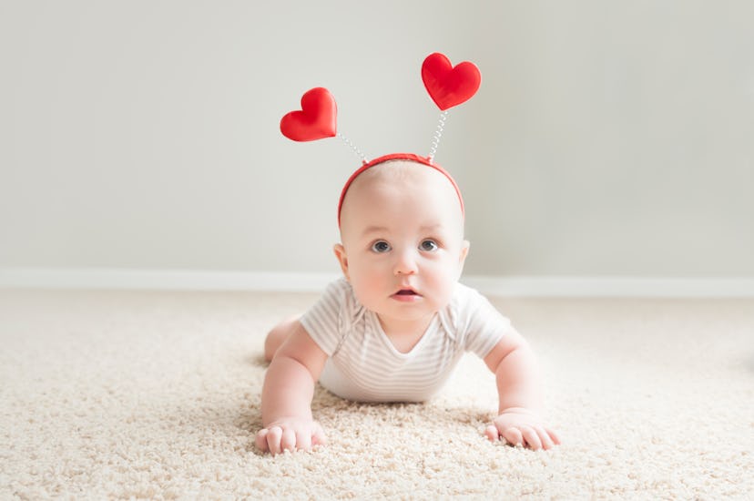 baby with heart headband what does it mean when you're born on valentine's day?