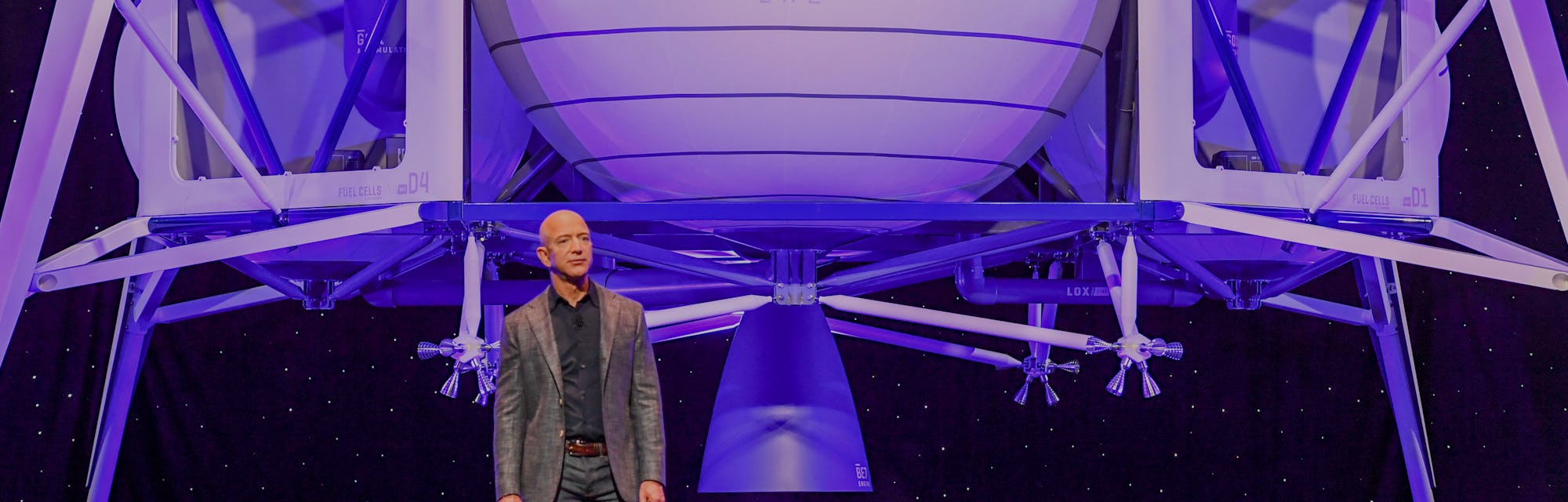 Jeff Bezos speaking at a presentation for his rocket company Blue Origin.