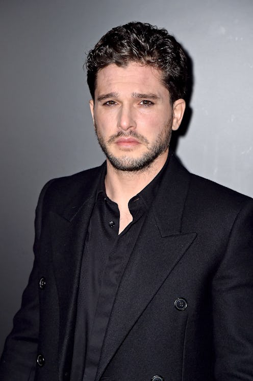 Kit Harrington at the St. Laurent fashion show during Paris Fashion Week. Photo via Getty Images