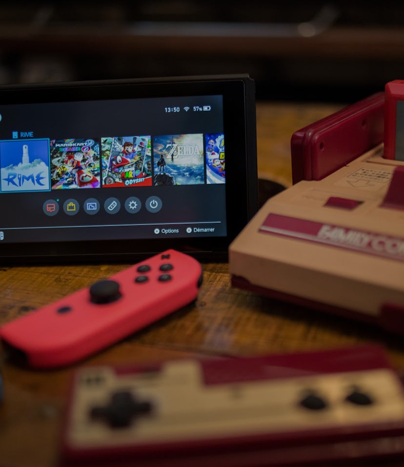 A Nintendo Switch is seen on a counter.