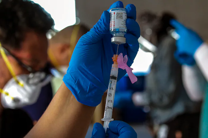Reports of wealthy people lining up for vaccines in poor neighborhoods across the U.S.