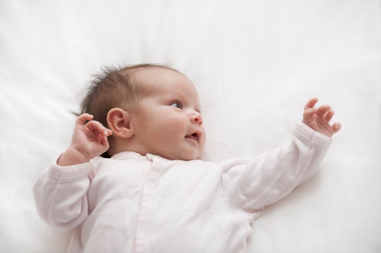 infant waving arms