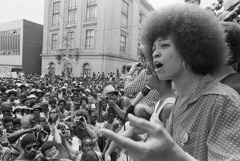 Angela Davis gives a speech. These 25 inspiring quotes from Black women can help celebrate Black His...
