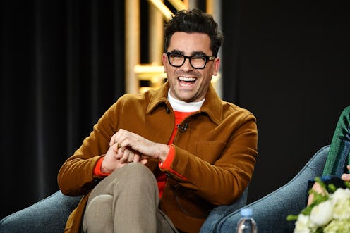 Dan Levy laughing. Photo via Getty Images
