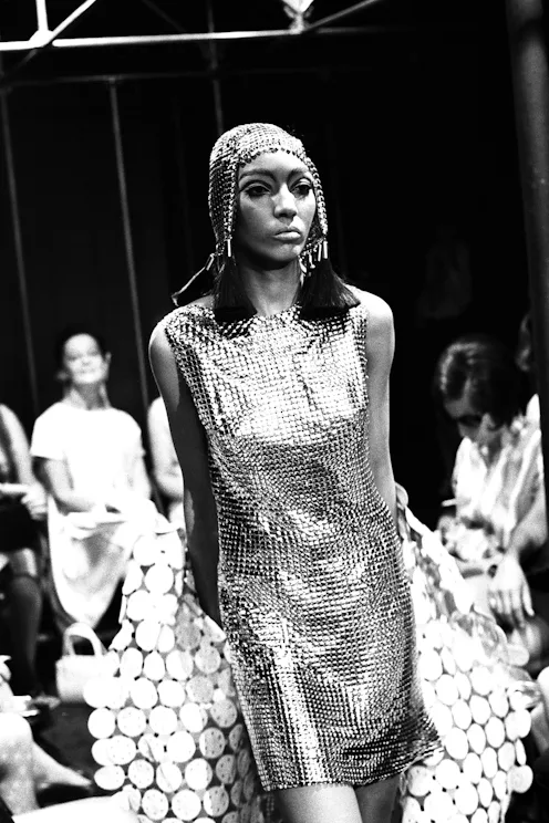 iconic runway dresses When fashion becomes performance. In 1999, Shalom Harlow closed the show for Alexander McQueen in one of the most iconic moments in runway history. A dress transformed live, blurring the line between