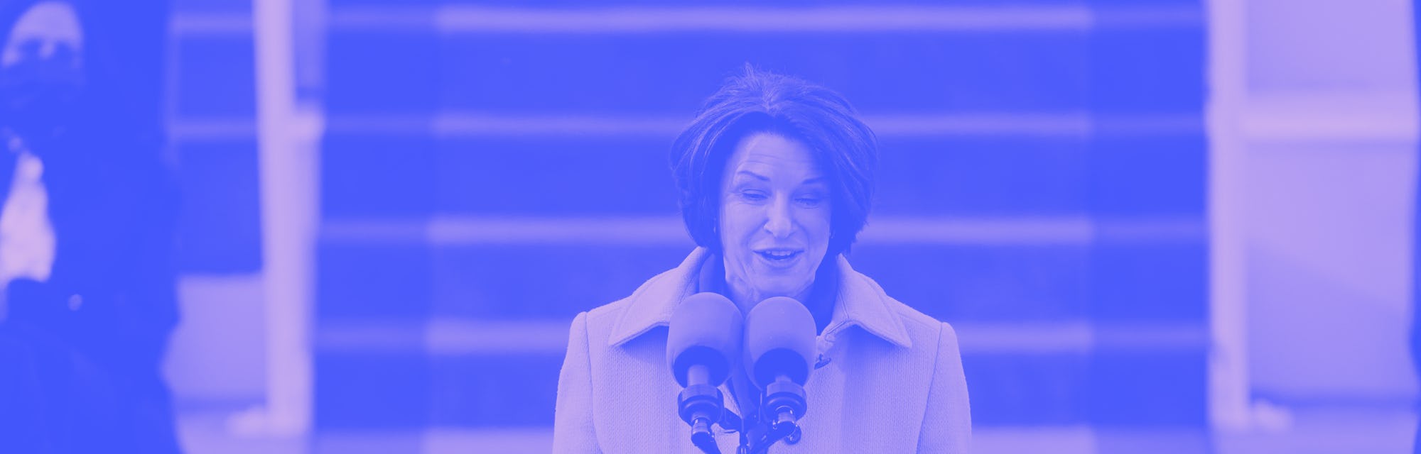 Democratic senator Amy Klobuchar is seen at a podium on Inauguration Day.