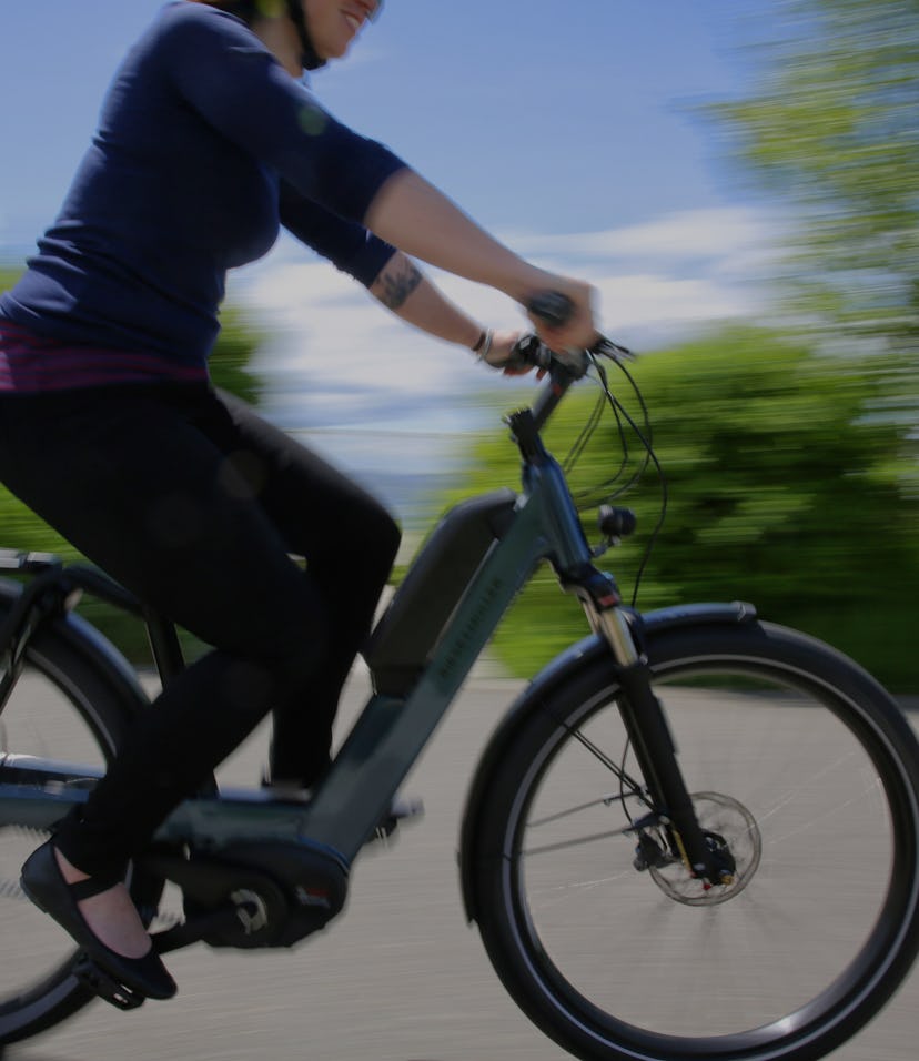 Person riding an electric bicycle.