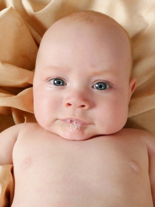 baby blowing bubbles