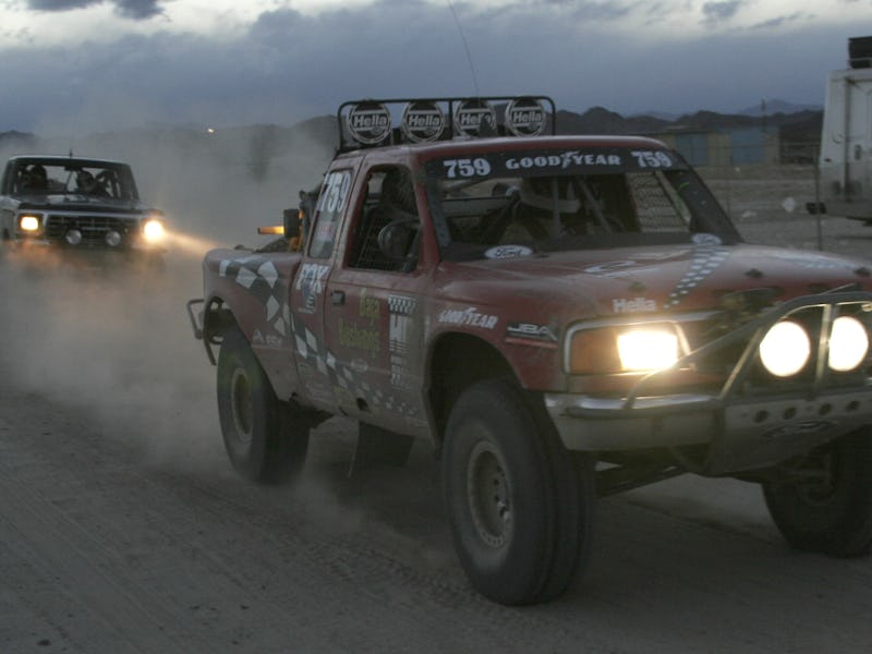Pickup trucks racing at San Felipe 250 in Baja, California.