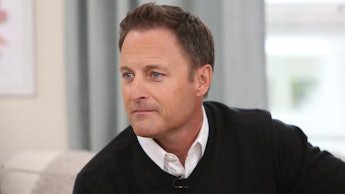 Chris Harrison, host of "The Bachelor," in a black sweater and white shirt