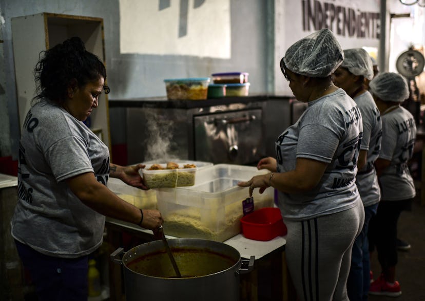 woman at soup kitchen